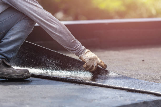 Professional Basement Waterproofing technician working in Danbury, TX